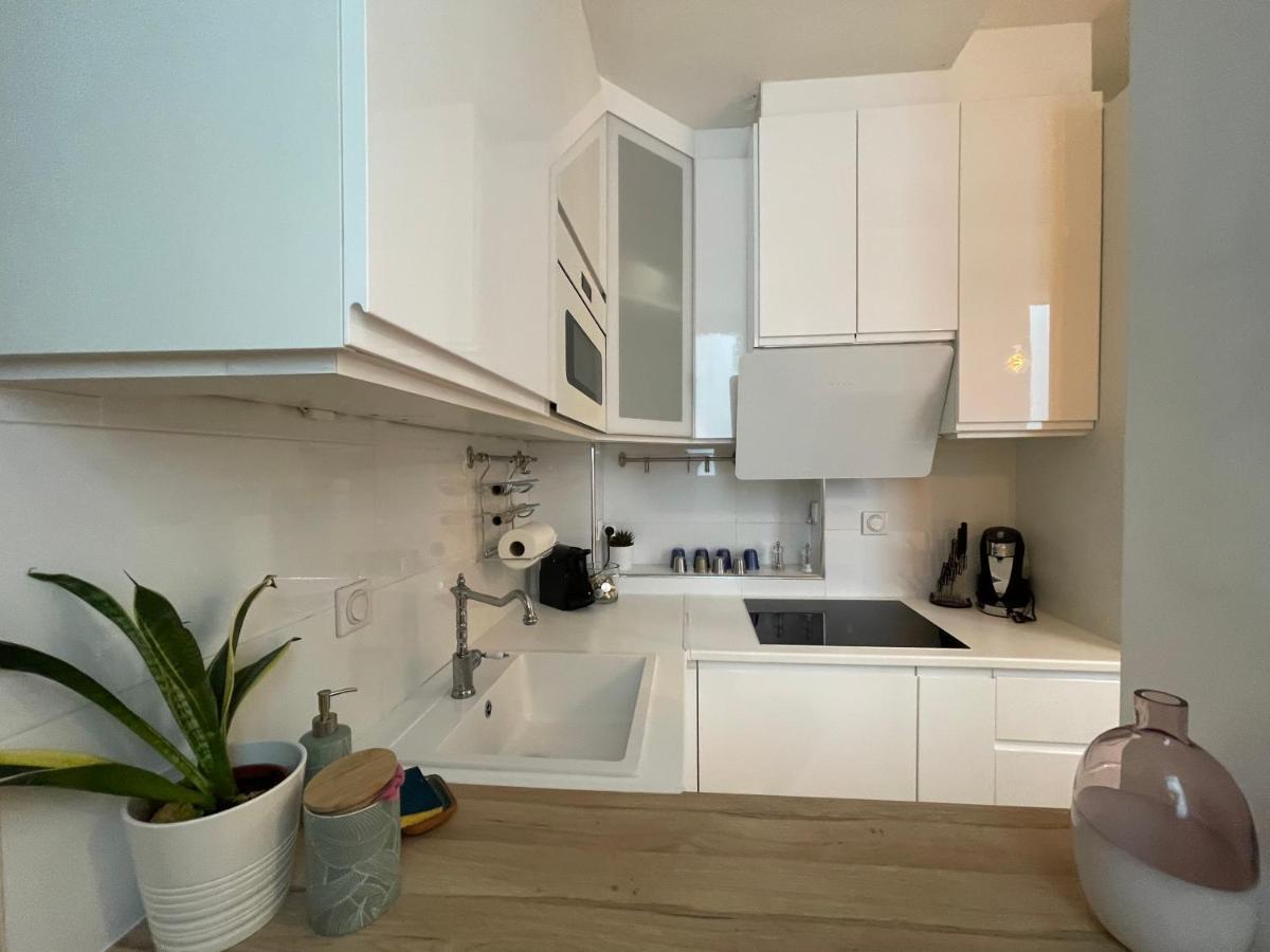 Le Nid Douillet De Patricia Apartment Paris Bagian luar foto