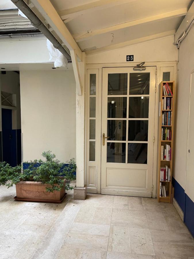 Le Nid Douillet De Patricia Apartment Paris Bagian luar foto